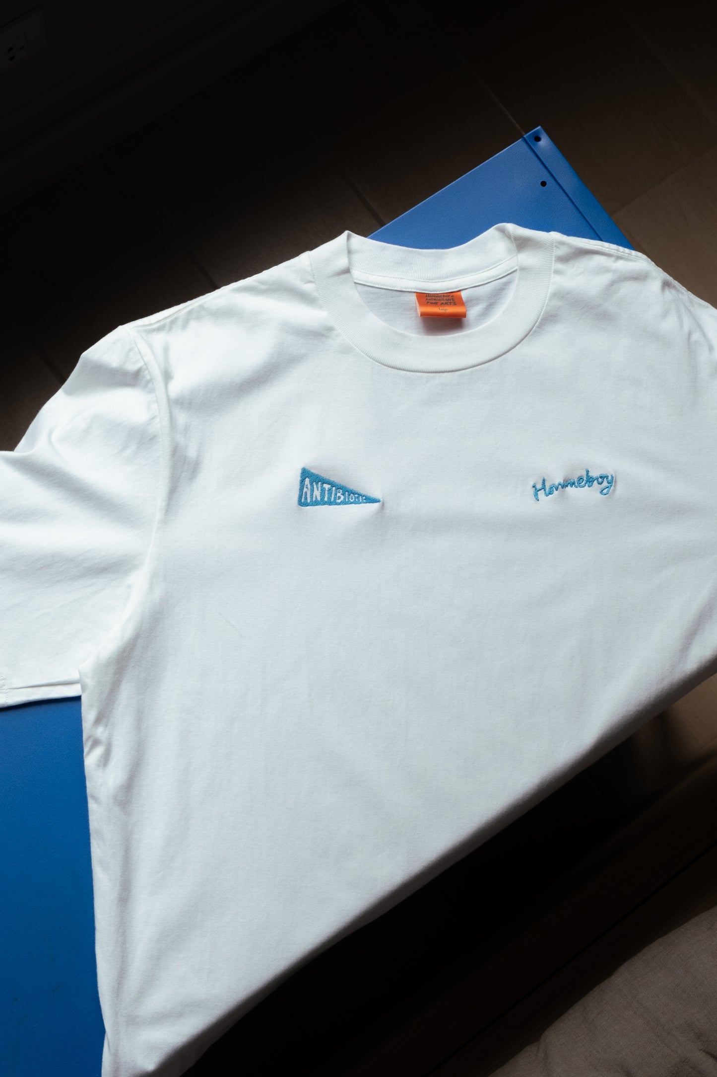 'Galerie' SS Tee (Warm White) - Hommeboy & Antibiotic Smile