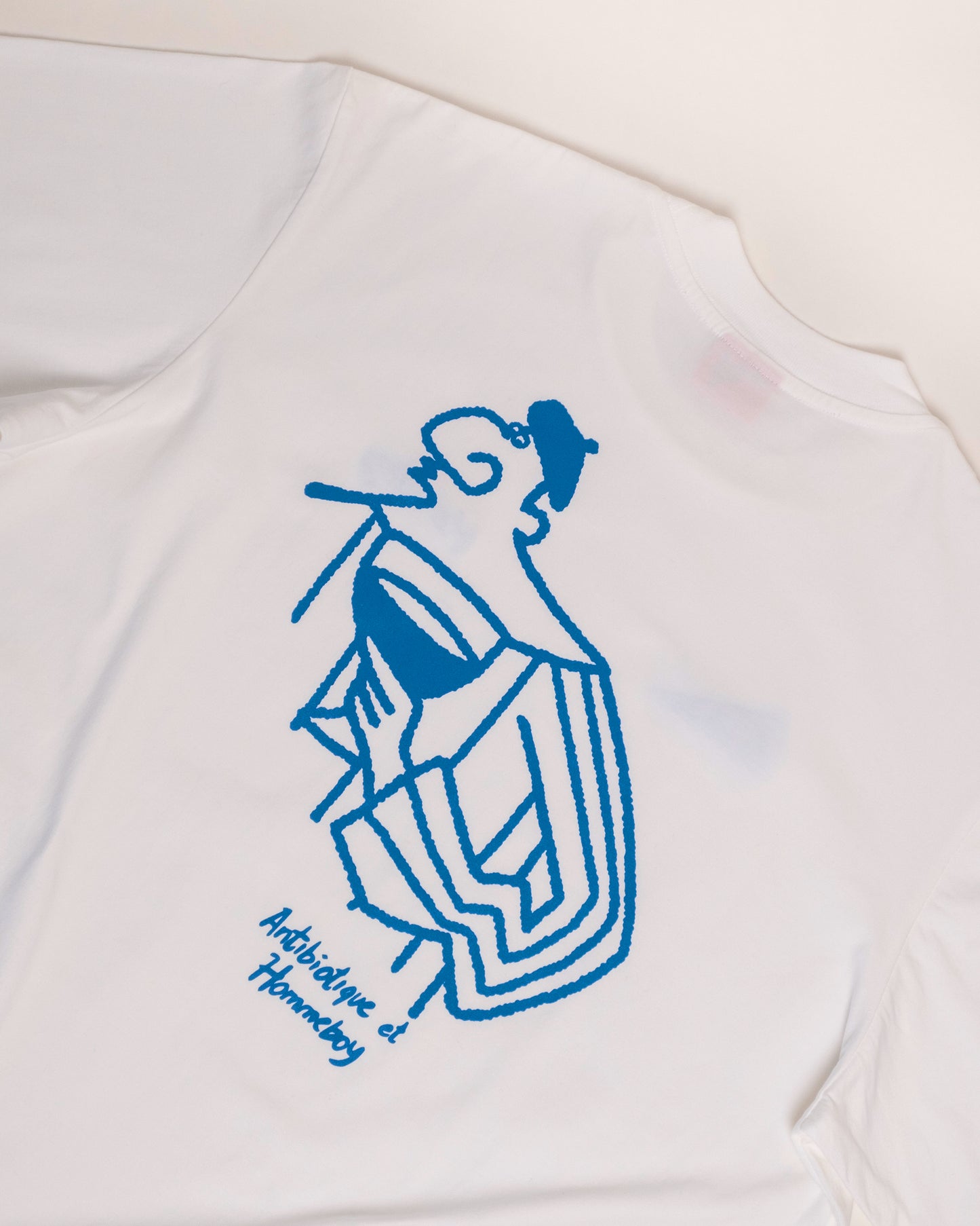 'Galerie' SS Tee (Warm White) - Hommeboy & Antibiotic Smile