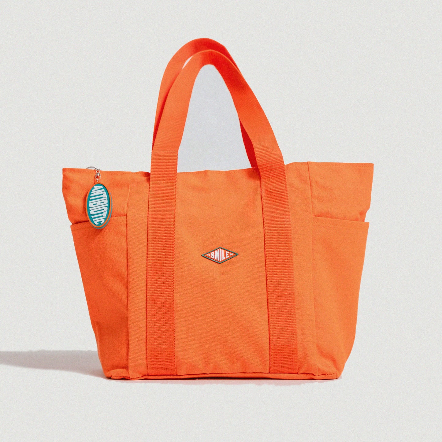 'Smile Badge' Multi-Pocket Tote Bag w/ Keychain