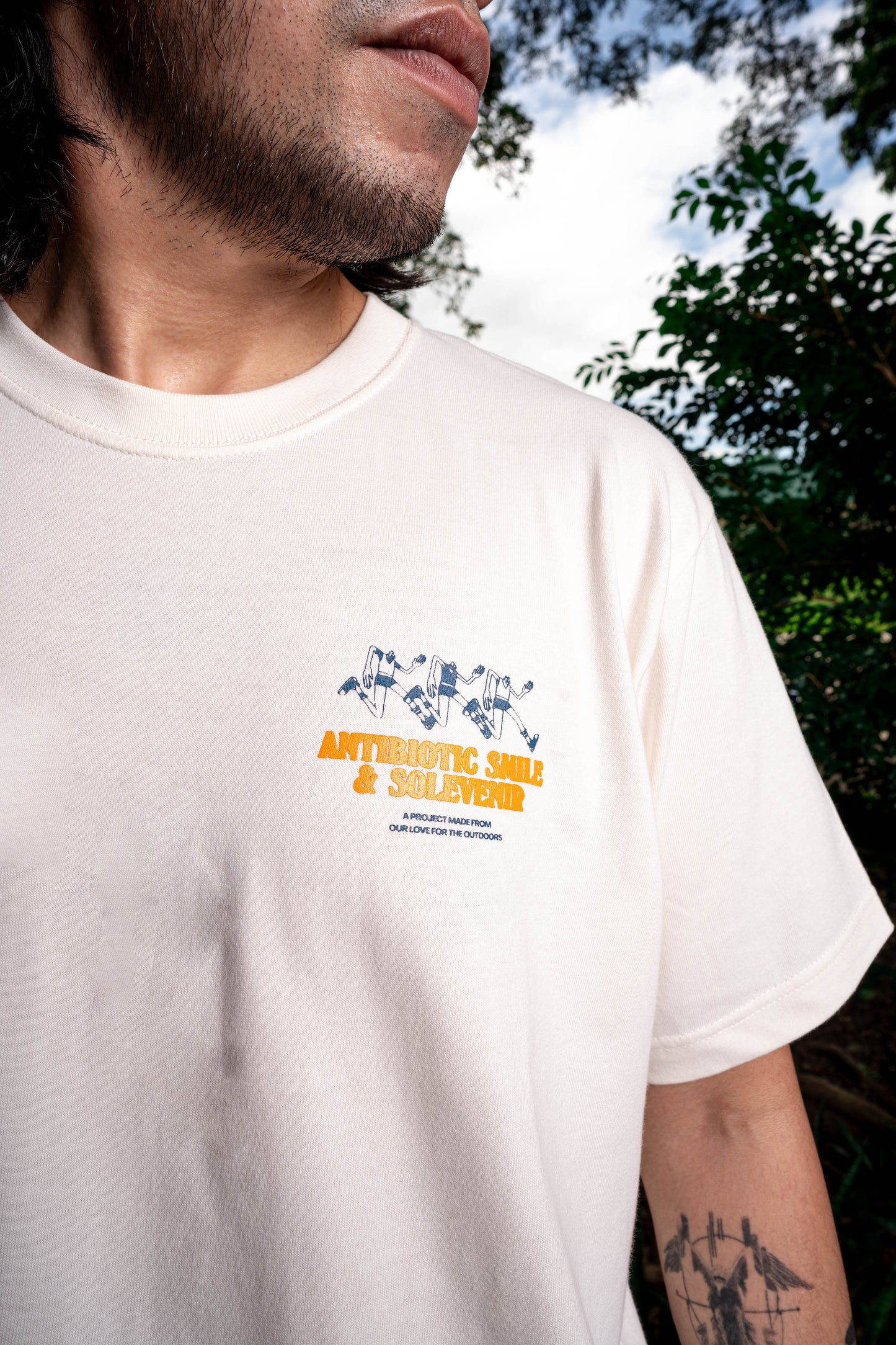 'Jog' Tee - Antibiotic Smile & Solevenir Collab (Ivory)
